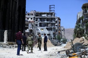 Russian police inspect destruction in Douma city, Eastern Ghouta, the countryside of Damascus, Syria, 16 April 2018. According to media reports, the Syrian army had recently driven the rebel fighters of Jaysh al-Islam (Army of Islam) out of the city. Jaysh al-Islam had control over Douma for the past six years.  EPA/STR